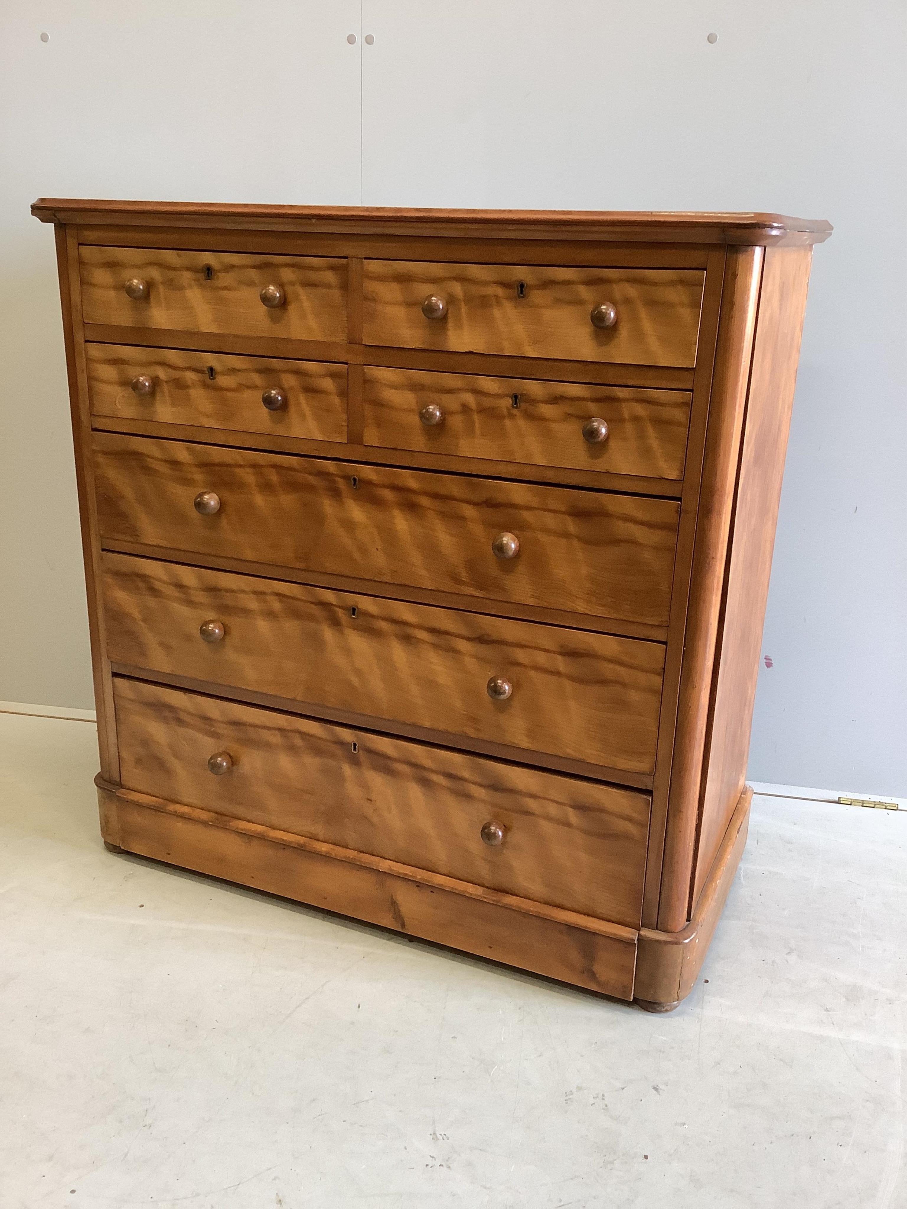 A Victorian satin birch chest of drawers, stamped Moore and Hunton, London, width 104cm, depth 51cm, height 105cm. Condition - poor to fair